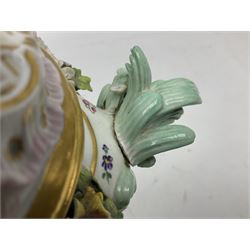 Meissen potpourri vase and cover, for restoration, of baluster form decorated with hand painted panel of a courting couple, and panel of a floral spray, further detailed with hand painted sprigs and encrusted flowers, flanked by two putti, with blue crossed swords mark beneath, H25cm