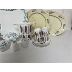 Victorian cabaret set,  comprising teapot, milk jug, covered sucrier, open sucrier, two cups and saucers upon a tray, together with Susie Cooper Hyde Park pattern coffee set, comprising coffee pot, four coffee cans and saucers, dessert plates and three plates in a similar design 