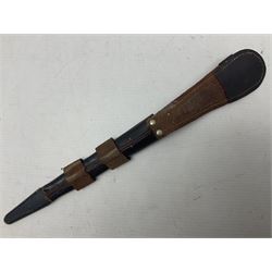 Third Pattern Commando Knife or Dagger with 17.5cm flattened diamond section blade and regulation black painted ribbed copper hilt with brass pommel nut; stamped William Rodgers Sheffield England to the cross-piece; in black painted brass mounted leather scabbard L34.5cm overall