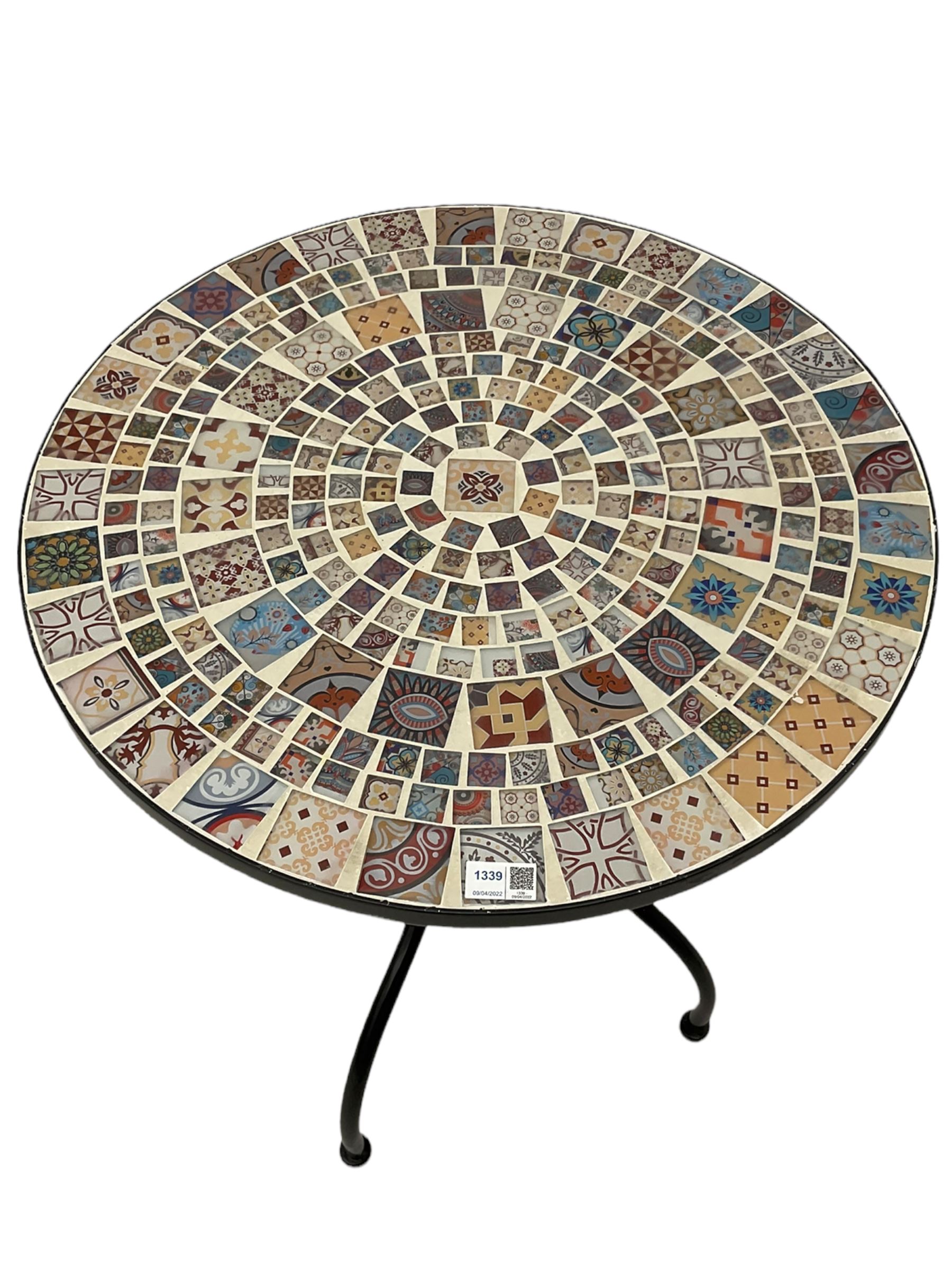 Black painted metal bistro set, circular table with mosaic top, and pair of folding chairs with mosaic panels 
