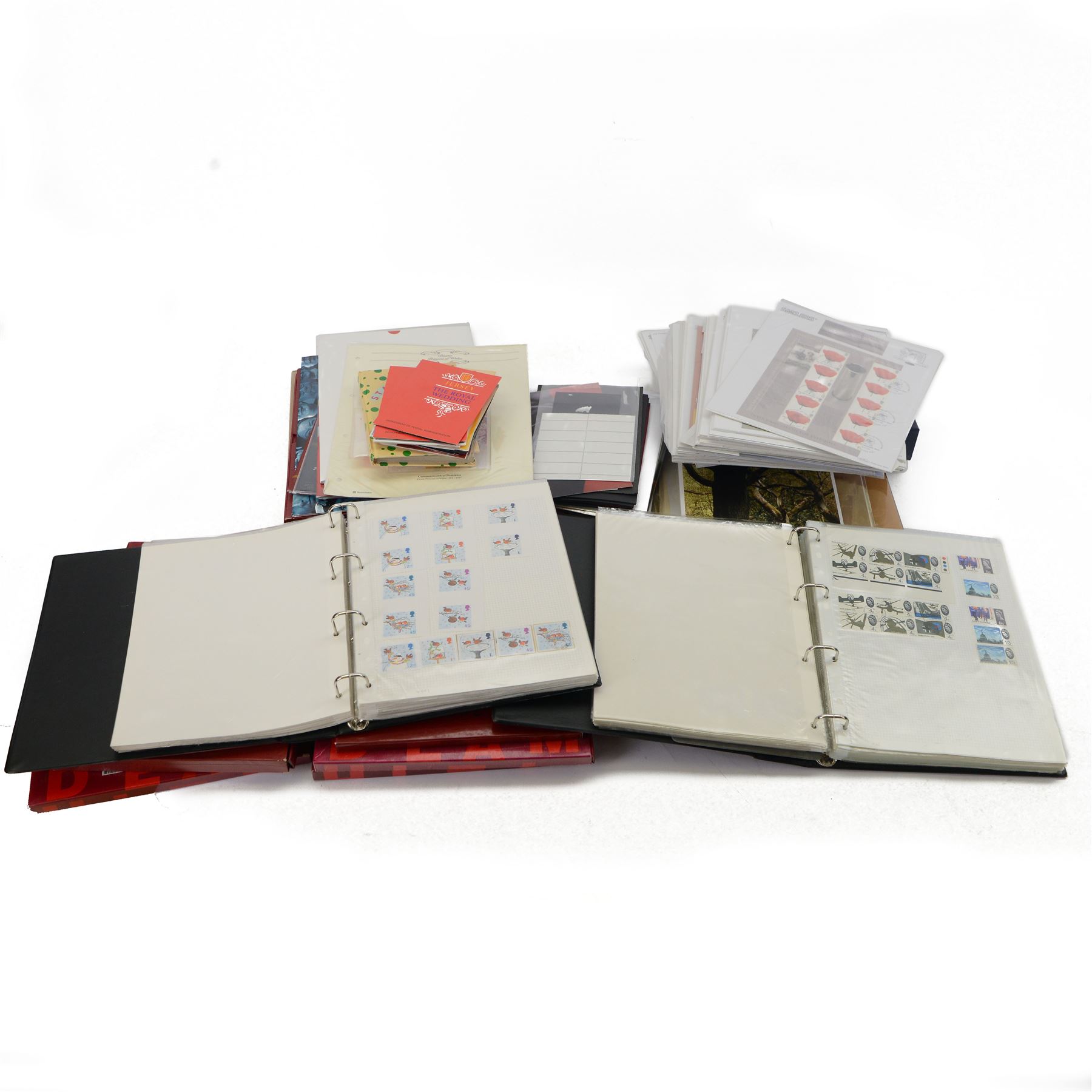 Stamps including Benham commemorative postmarked part sheets, various covers from the 'Royal Mail Millennium Collection', China modern commemorative stamps including 1997, 1998, 1999, 2000, 2001 and 2002, Queen Elizabeth II pre and post decimal issues etc, in various albums, folders and loose 