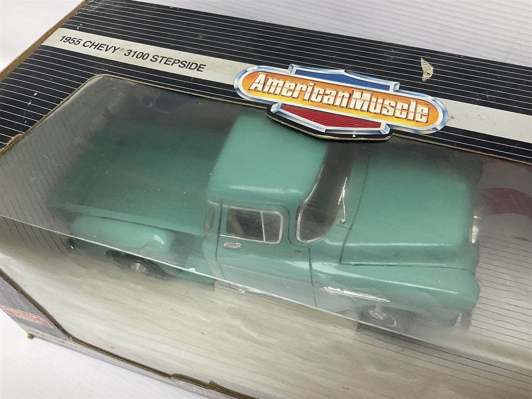 Seven 1:18 scale die-cast models by Ertl, Road legends, Maisto, Solido etc including two Coca Cola promotional vehicles; five boxed (7)