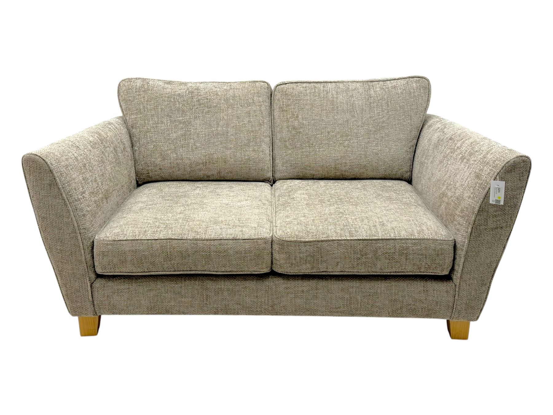 Oak Furnitureland Two seat contemporary sofa upholstered in beige fabric