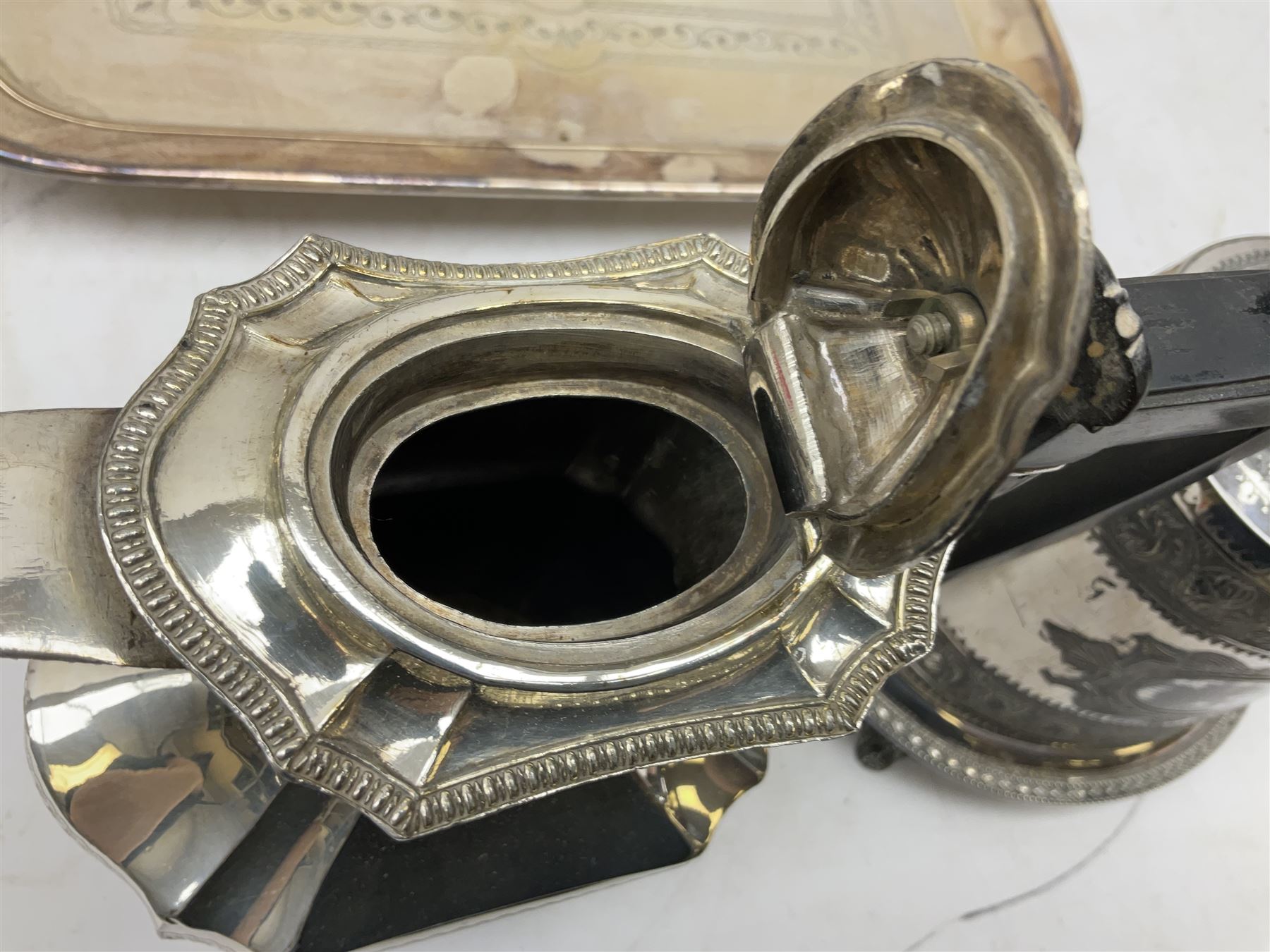 Early 20th century hallmarked silver trumpet vase stamped J & R Griffin (Joseph & Richard Griffin), Chester 1917, with weighted base, together with a 19th century silver-plate biscuit barrel by JK&Co, ornately engraved throughout, John Round & Son silver plated twin handled cup, and other silver plated and other metal ware to include ornate teapots, tray etc