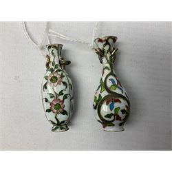 Two miniature Chinese cloisonné vases, each decorated with foliate design upon a white ground, each approximately H5cm