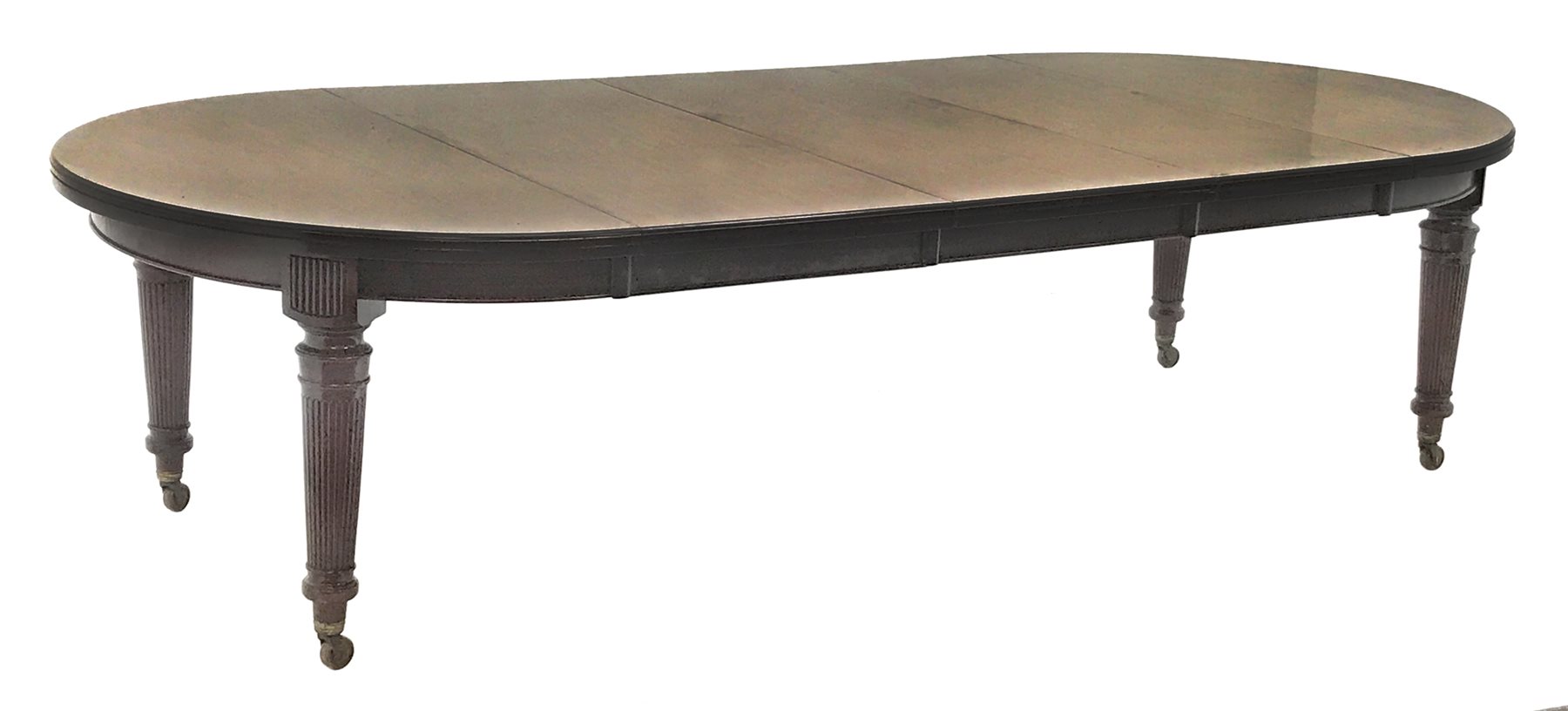 Spillman & Co. London - large Victorian mahogany extending dining table with three additional leaves, on turned and reeded supports with ceramic castors, ivorine label to underneath 'Spillman & Co. St. Martins Lane, London', diameter - 137cm (closed), L302cm (with all leaves)
