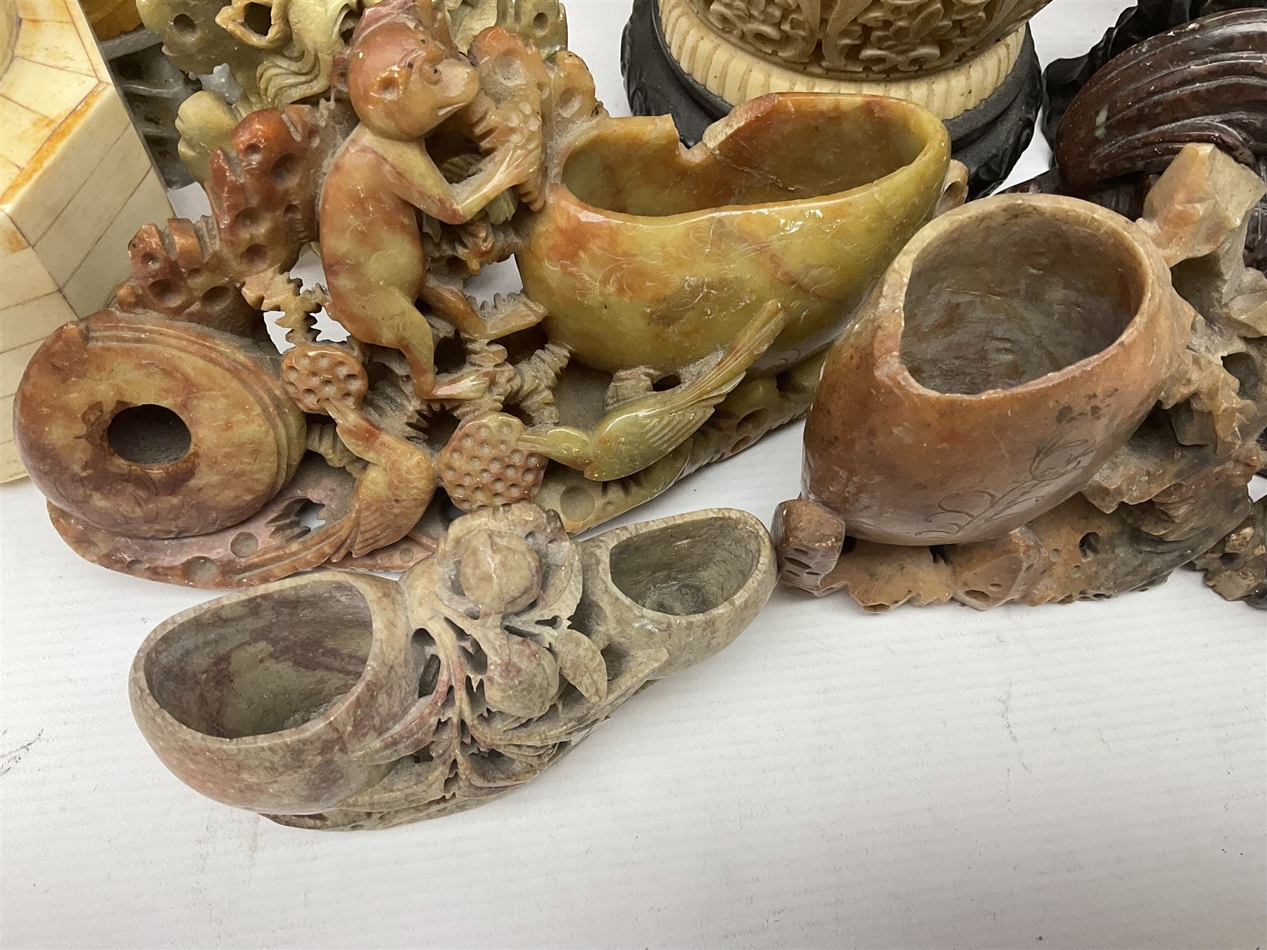 Collection of hardstone and soapstone, including hardstone seal carved temple dogs finial, inscription on base, together with inkwells, vases etc  
