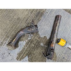 REGISTERED FIREARMS DEALERS ONLY - Reproduction flintlock pistol, the full walnut stock with brass filigree inlay and mounts and skull crusher butt L46cm; no visible proof marks - Disposed 25.06.25 - Notified 24.07.25