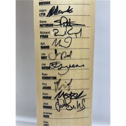 Two signed Yorkshire County cricket bats, from 2013 and 2014 seasons, bearing signatures including Johnny Bairstow, Joe Root, Tim Bresnan, Andrew Gale, etc