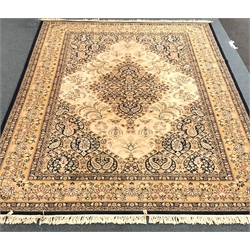  Keshan blue and gold ground rug, central medallion repeating border, 366cm x 274cm  