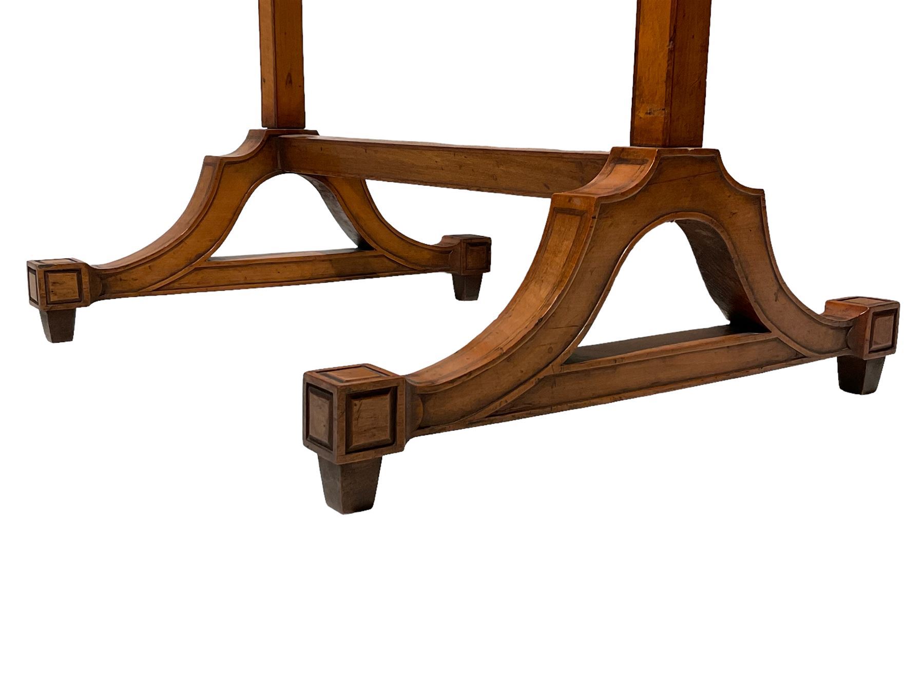 Late George III satinwood fire screen, upholstered in floral blue fabric, fold-down lipped tray with central figured walnut oval inlay, on splayed supports joined by stretchers 