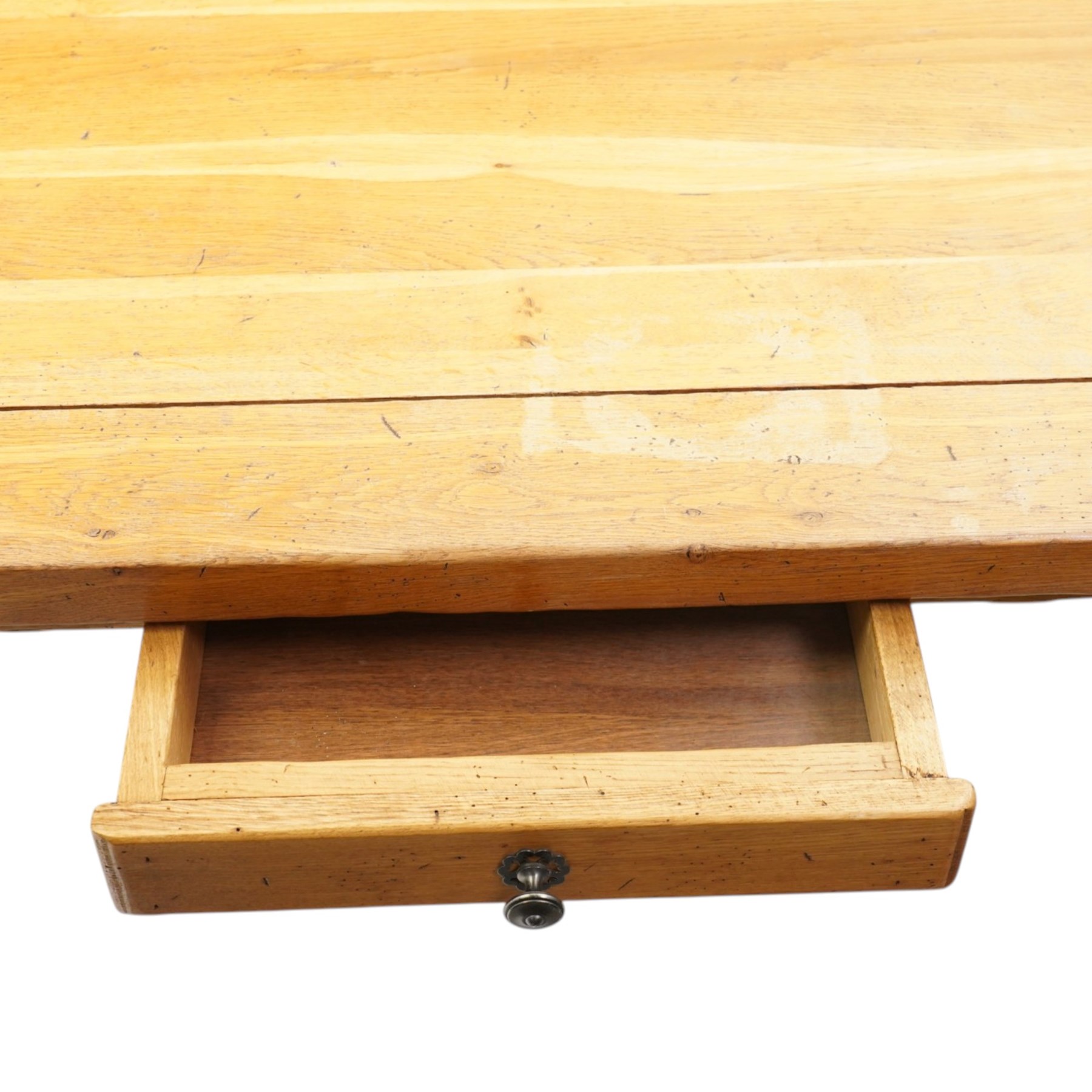 Modern solid oak extending dining table and eight upholstered chairs, the table of plank top construction raised on square supports, extended to 231cm with leaves 
