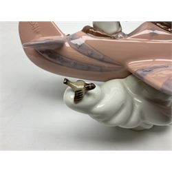 Lladro figure, Don't Look Down, modelled as a girl and boy in a plane, sculpted by Joan Coderch, no 5698, year issued 1990, year retired 2004, H17cm