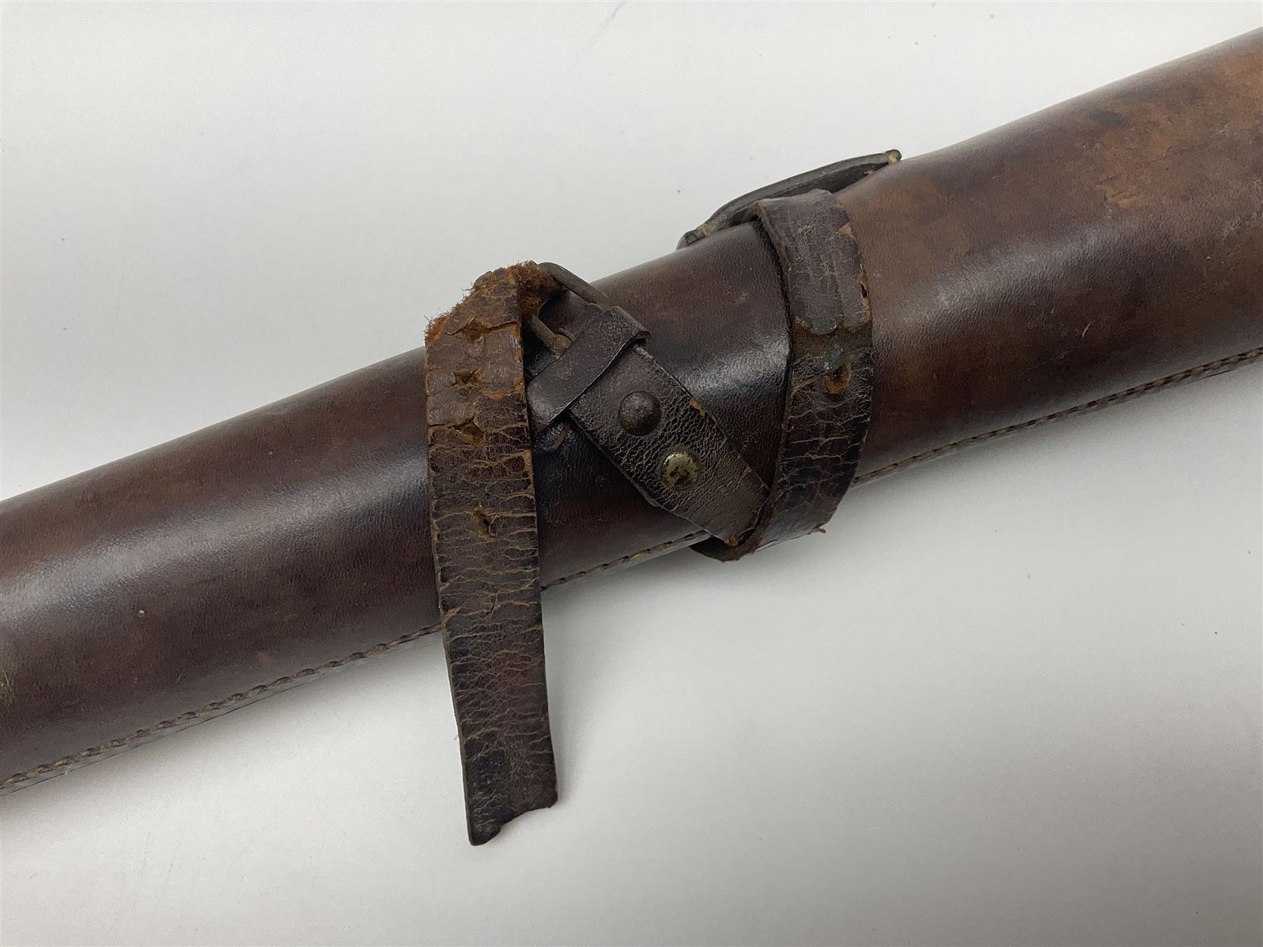 19th century telescopic hunting horn, the bell engraved 'The Beaufort', with makers mark Kohler & Son, makers, 61 Victoria Street, Westminster (from Covent garden) London, in a leather sheath, horn full extended L91cm 