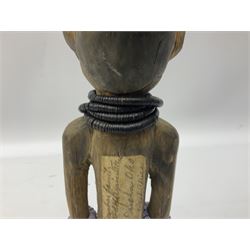 Early 20th century West African Yoruba family wooden figure of Orisha Oko, the god of farming/agriculture, carved from the solid, bears manuscript label of provenance verso H26.5cm