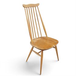 Ercol - 'Goldsmith' light elm set of four dining chairs, shaped cresting rail above seven spindles, dished seat raised on tapering supports with H-stretcher