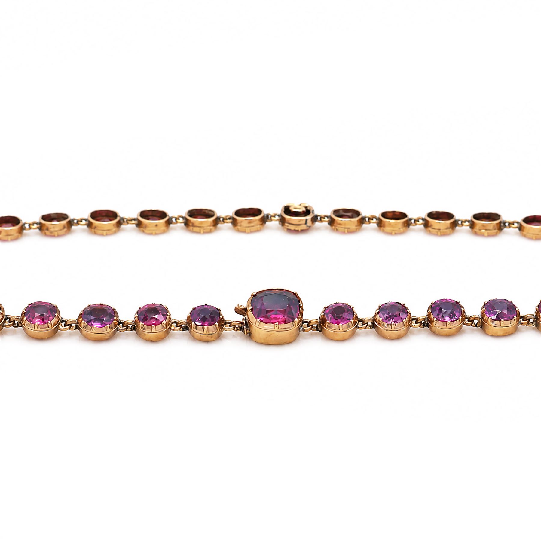 19th century gold garnet rivière necklace, set with forty-four graduating cushion cut rhodolite garnets (possibly doublets), in a velvet and silk lined case by Ollivant & Botsford, Manchester