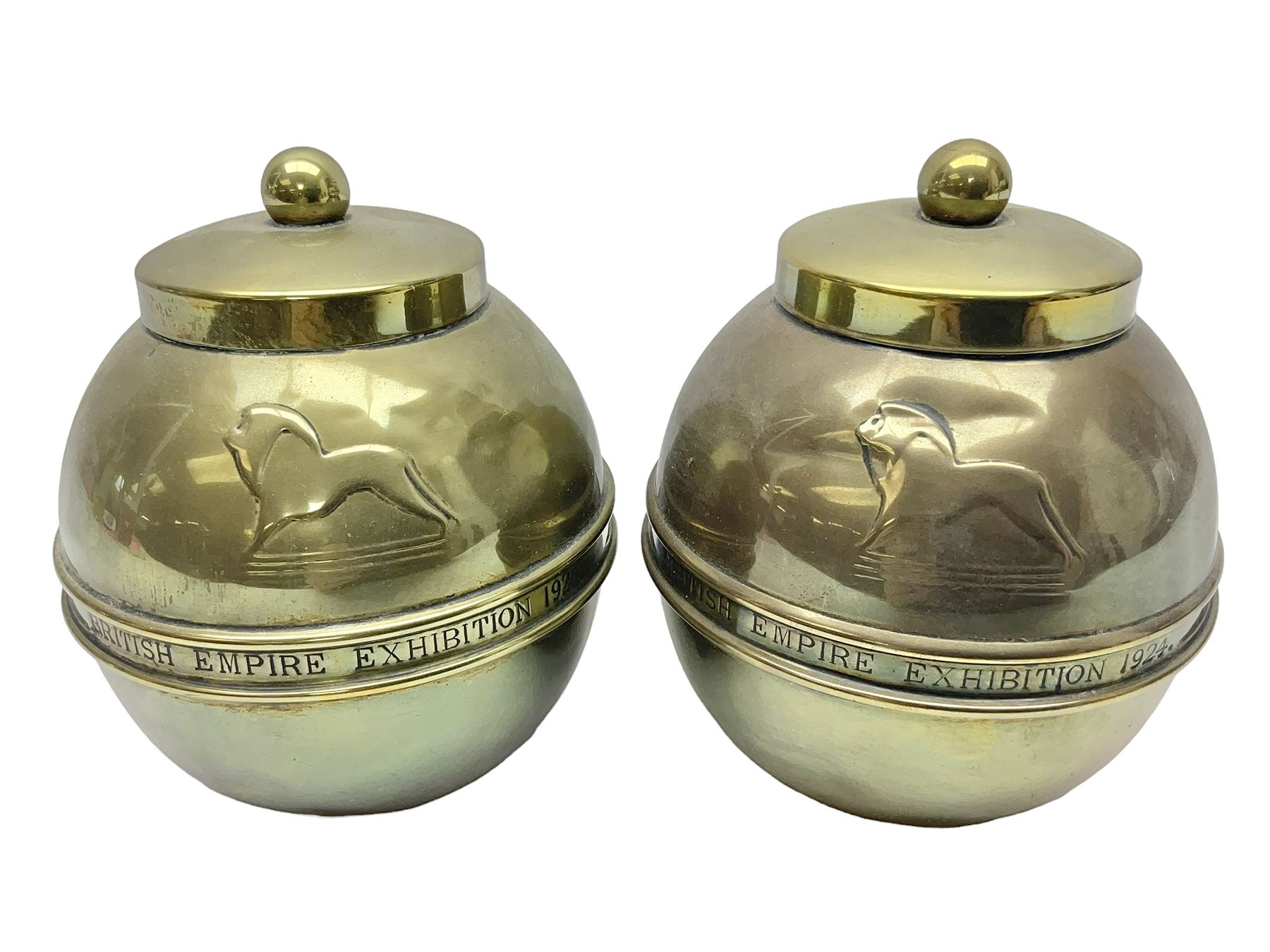 Pair of brass 1924 commemorative tea caddies, of ovoid form the waist embossed with 'British Empire Exhibition 1924' 'Lipton's Souvenir Tea Caddy', H18cm