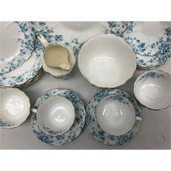 Edwardian David Chapman & Sons tea service for six, of lobed form decorated with blue transfer printed foliate decoration and gilt rims