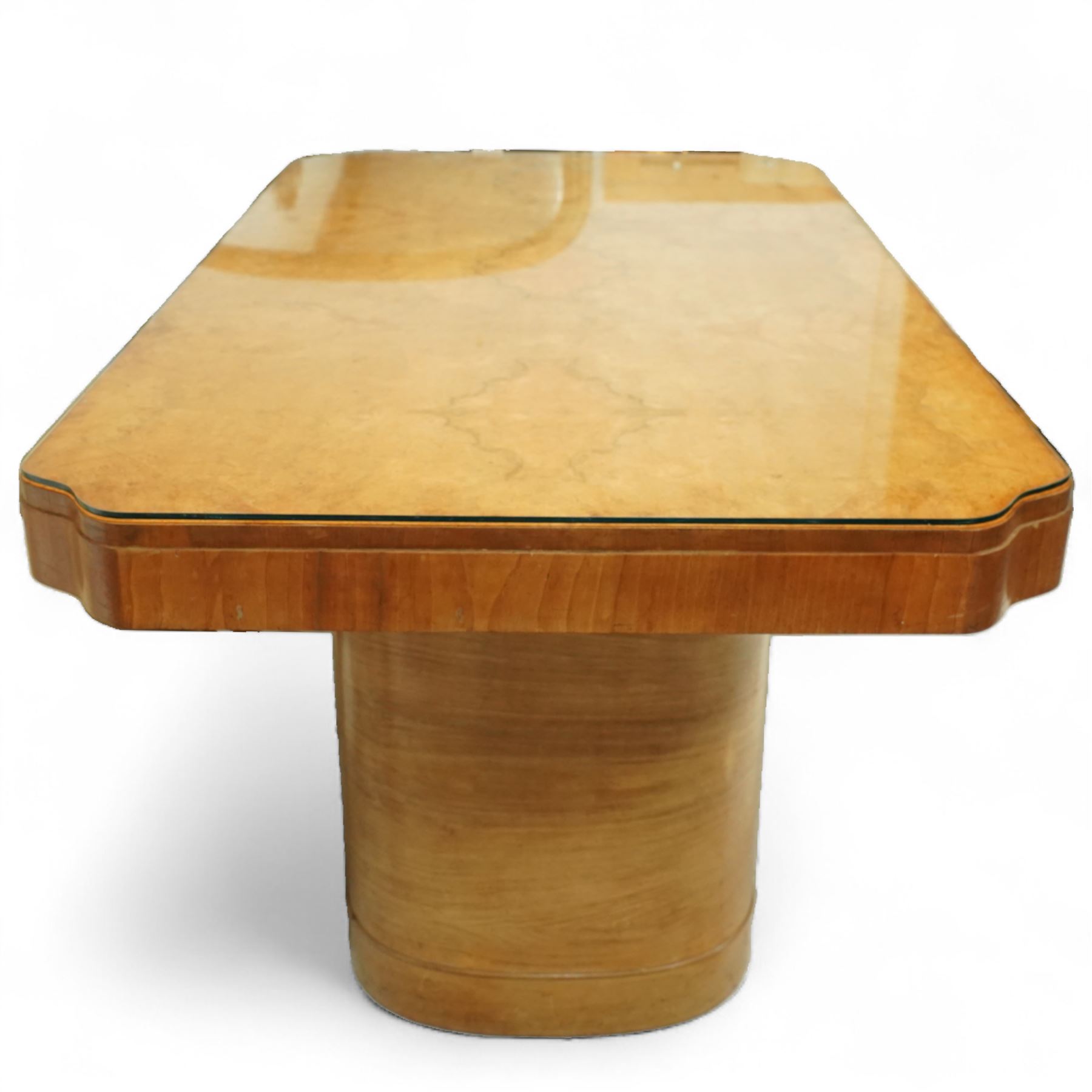 In the manner of Harry & Lou Epstein - Art Deco figured walnut veneered dining table, rectangular top with canted corners and glass protective top, edge with gently canted profile, on two rounded drum-shaped pedestals together with a set of four mid-century style walnut chairs, with elegant scroll and walnut veneered backs, upholstered in a light cream leather, 54x44x96cm