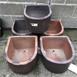  Five medium 'D' shaped rustic frost proof pots, W42cm, H26cm, D46cm   