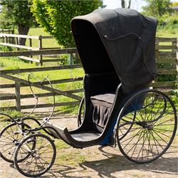 Victorian Bath Chair / Invalid Carriage Converted for Horse Drawn Use

A Victorian bath chair or invalid carriage, later converted for horse drawn use, with black painted bodywork, blue side panels, folding black leather hood and upholstered single passenger seat. The carriage is fitted with large rear wire spoked wheels, smaller front steering wheels, long shafts, footwell and curved body sides, consistent with a late nineteenth century invalid carriage or bath chair form adapted for pony or light horse use.

Features

Bath chair or invalid carriage form
Later converted for horse drawn use
Folding black leather hood
Single upholstered passenger seat
Deep footwell
Black painted body with blue side panels
Large rear wire spoked wheels
Smaller front steering wheels
Long shafts
Lightweight carriage frame

Dimensions:
Overall length: 380 cm
Body length: 204 cm
Width: 88 cm
Height: 178 cm

Wheel Diameters:
Front wheels: 47 cm
Rear wheels: 88 cm

Seating:
Driver: 1
Passenger: None