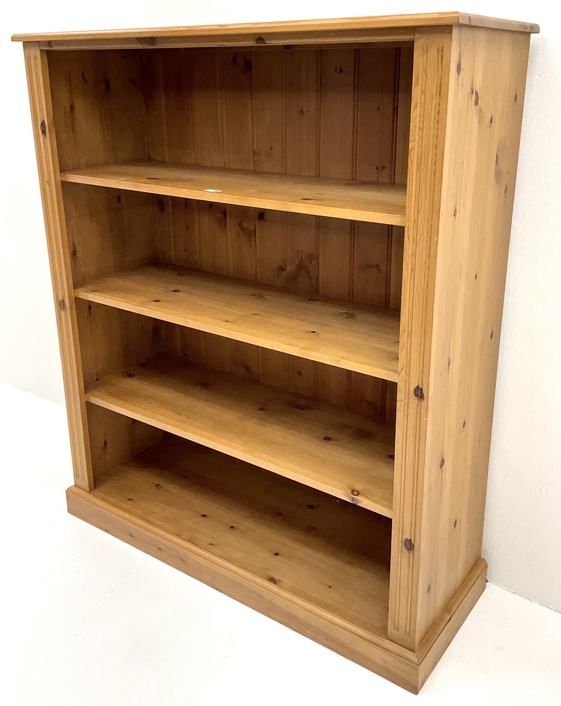 Pine bookcase, three shelves, platform base The Furnishings Sale