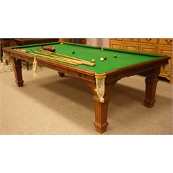  Edwardian 'E.J.Riley LTD' mahogany slate bed billiard table, with dining table leaves, green baize, four square tapering fluted supports, with accessories including ball set, cues, scoreboard and brushes, W133cm, H73cm, L255cm  