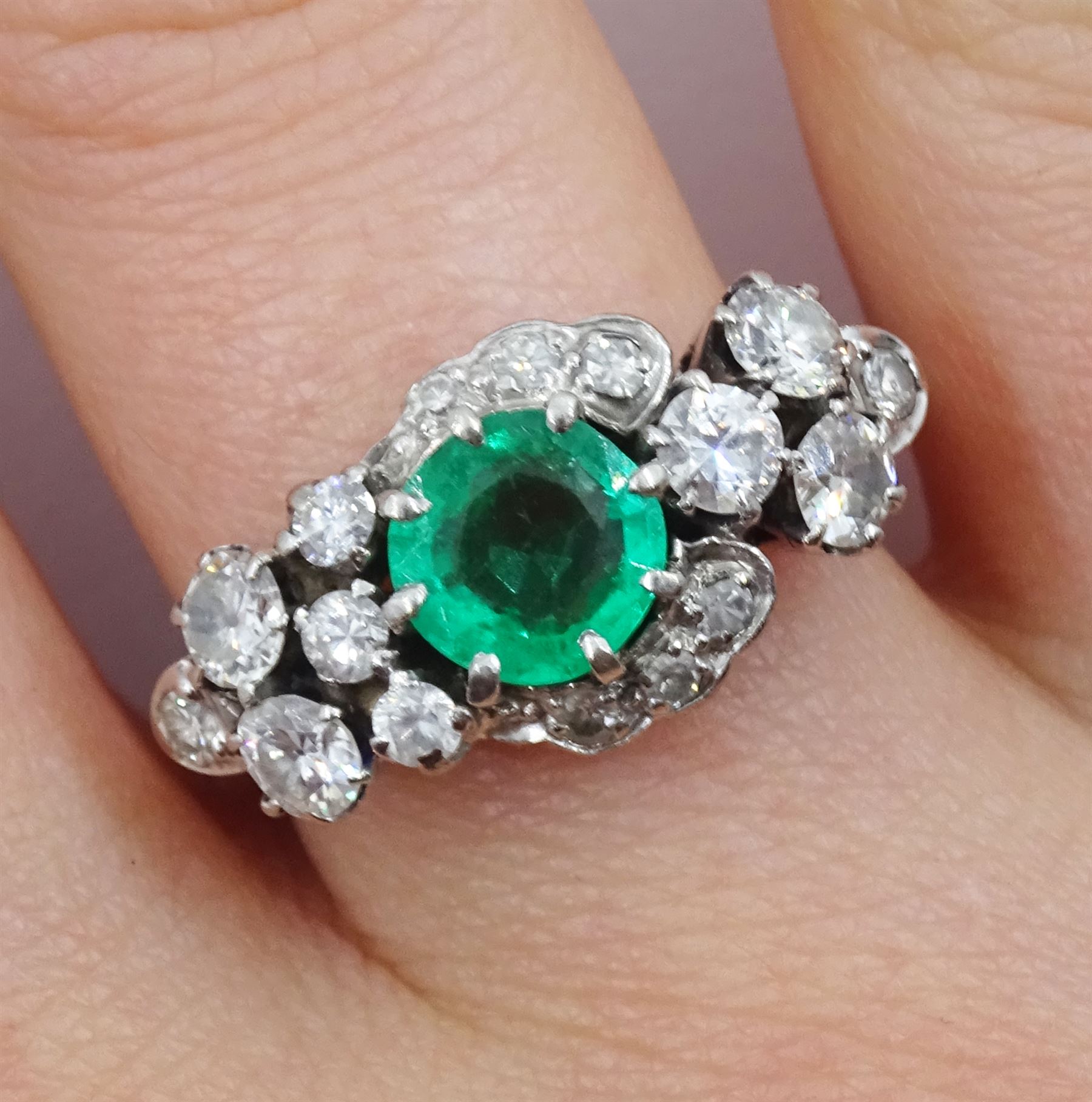 White gold round emerald and diamond cluster ring, stamped 18ct