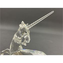 Twenty nine Swarovski Crystal animals, to include koala and baby, in frosted tree branch, elephants, polar bears, squirrel, monkeys, panda, unicorn and snails, etc 
