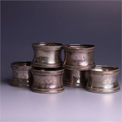 Six early 20th century French silver napkin rings, each with engraved initials, stamped wi...