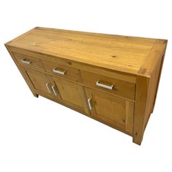 Light oak sideboard, fitted with three drawers and three cupboards, metal handles