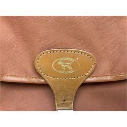 Miscellaneous shooting accessories - W.J. Bowman & Sons clay pigeon launcher; two leather cartridge belts; three cartridge bags; two canvas/leather game bags; and two metal/wooden cartridge boxes