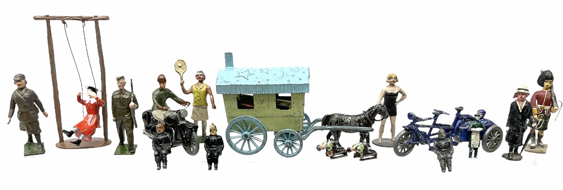 Selco Services gypsy caravan with horse, figure and steps; die-cast tandem combination; motorcycle with rider; die-cast girl-on-swing; and twelve various lead figures by Johilco etc