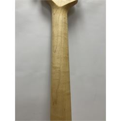 Ernie Ball Music Man Sting Ray 4 string bass guitar, in natural finish with roasted maple neck and tortoiseshell effect scratch guard, serial no 87485, in black Music Man hard case, guitar L114cm