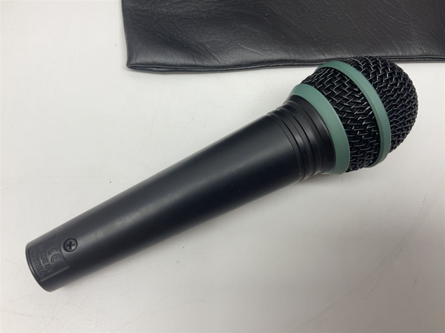 Vintage pair Akai ADM-8 Dynamic microphones; AKG D880 Dynamic microphone; cased; and Shure Betagreen BG1.0 vocal microphone; boxed; all with cables (4)