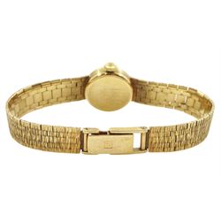 Tissot ladies 9ct gold manual wind wristwatch, silvered dial with baton hour markers, on integral 9ct gold bracelet, London 1972