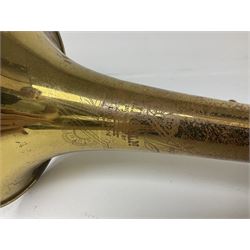 Three brass trombones comprising Elkhart Ind. USA 'CONN' model no.72H; Besson 'Concord'; and Selmer Distributed 'Lincoln'; two in carrying cases; and German B & M 'Champion' brass trumpet (4)