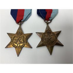 Eleven WW2 medals comprising three 1939-1945 war medals, two Defence medals, three 1939-1945 Stars, Atlantic Star, Africa Star and Italy Star; miniature QEII Naval LS & GC medal; all with ribbons; and WW2 postumous medal slip to Flight Sergeant L.N. Clark