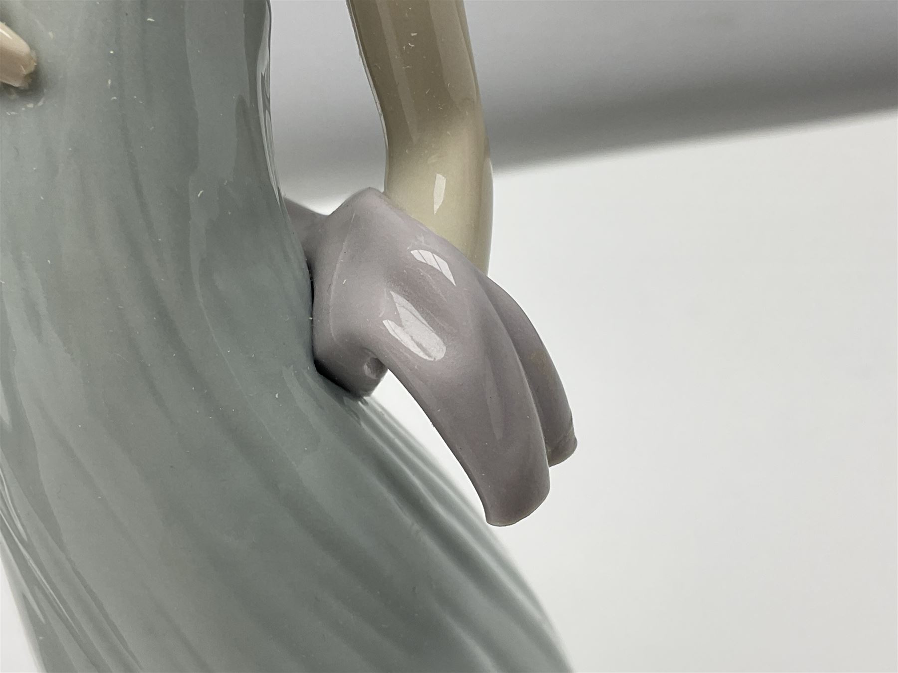 Three Lladro figures of ladies comprising 'The Flirt' model no 5789, 'Ingenue' model no 5487 and 'Carefree' model no 5790, all with boxes