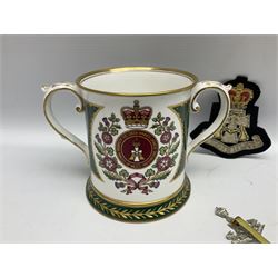 Limited edition Spode Green Howard's twin handled loving mug, no 205/300, with certificates, together with a Green Howards cased Tercentenary medal (1688-1988), cap badge and embroidered patch, largest H11.5cm