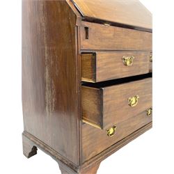 Georgian red walnut and mahogany bureau, moulded rectangular fall front with rounded upper corners, the interior fitted with sliding storage well, a combination of small drawers and pigeons holes, two short and two long drawers below, on bracket feet