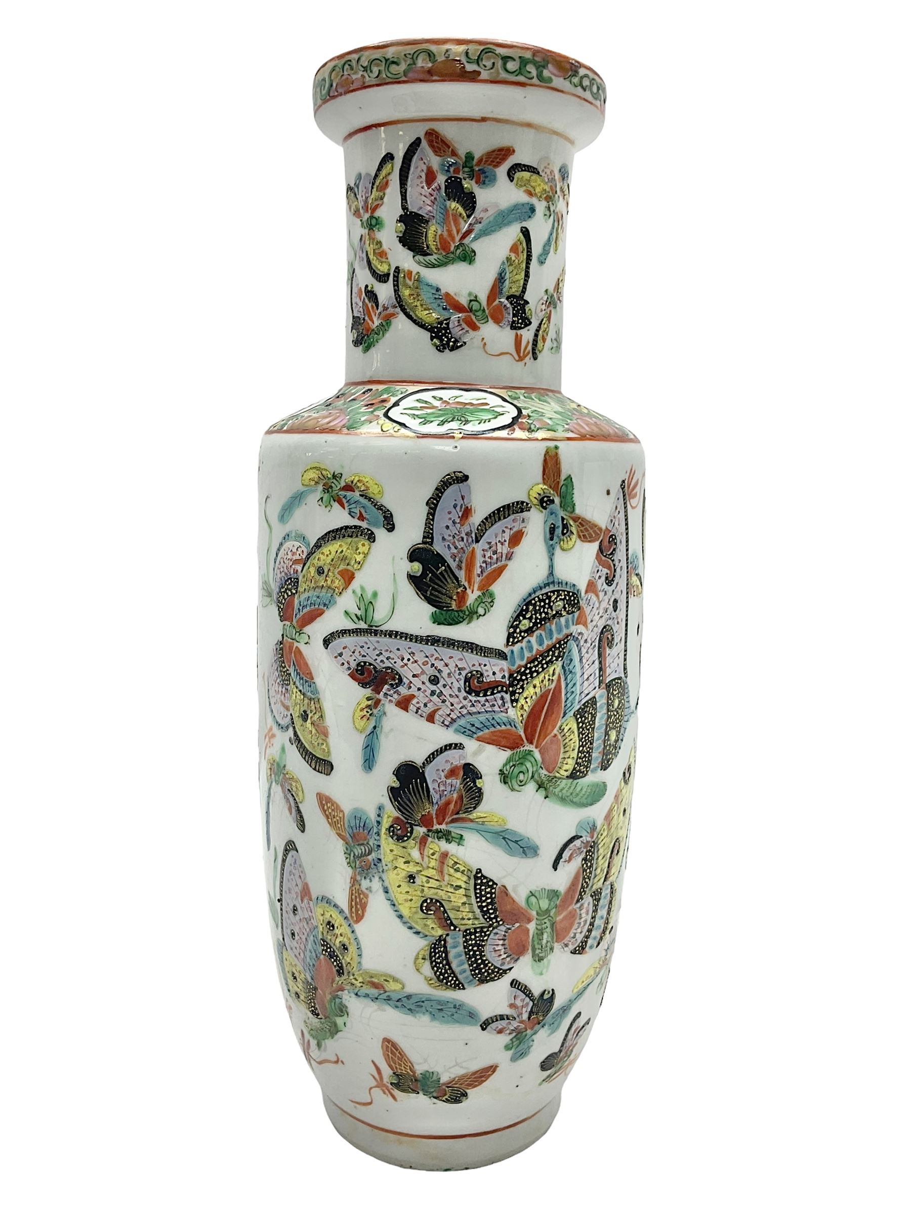 19th century Chinese Canton vase of slender baluster form, decorated with butterflies and floral panel to the neck, H30cm