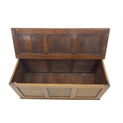 Early 20th century panelled oak blanket box, hinged top