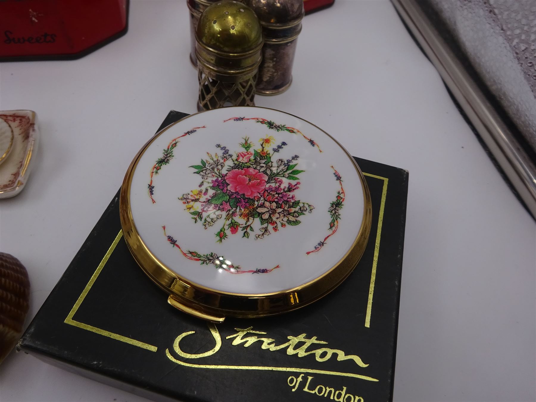 Minton table lighter decorated with a leaping salmon, signed T.Lee, with Ronson lighter mechanism, boxed, together with a Ronson Varaflame lighter, Stratton compact mirror, collection of Wade whimsies and a miniature Gemma teaset