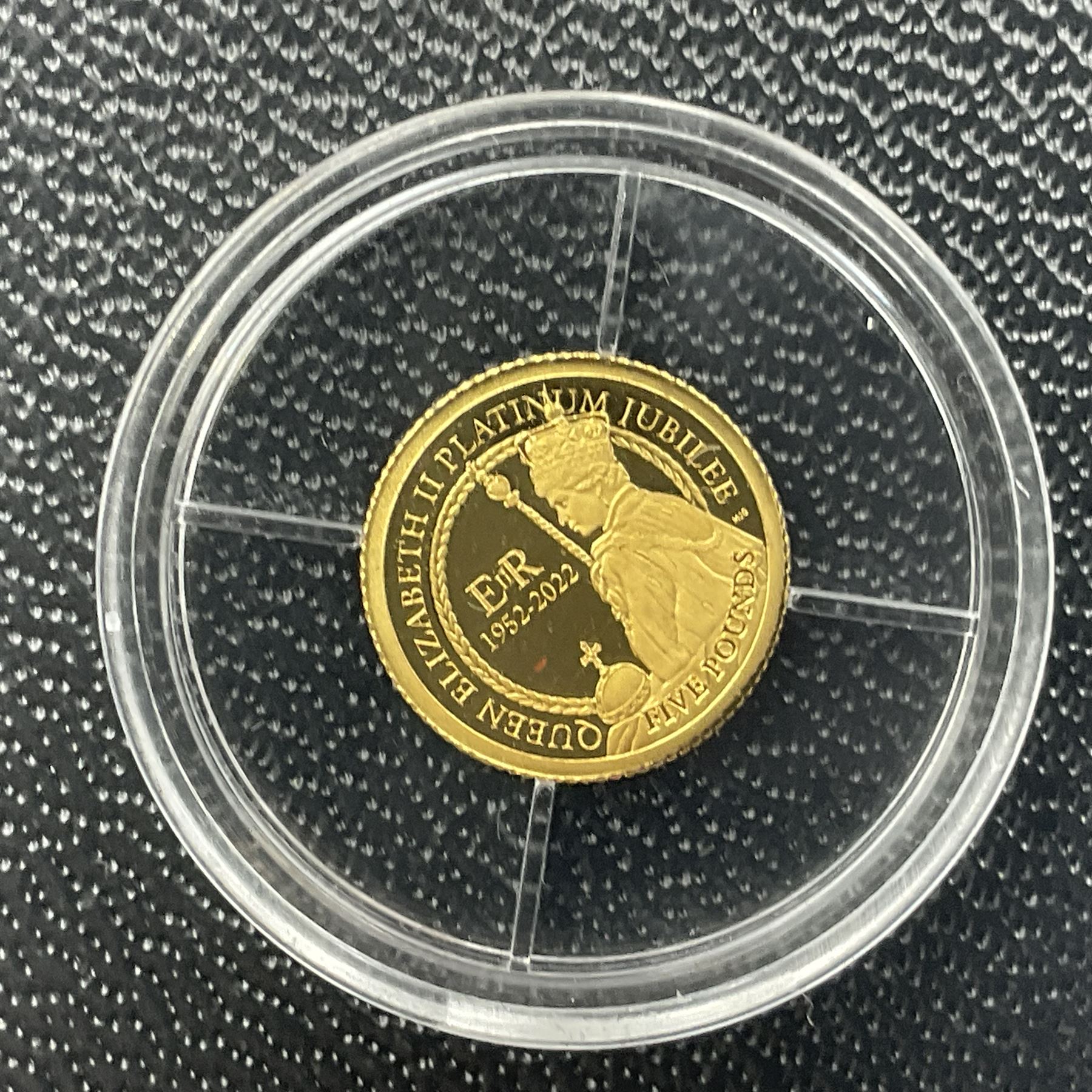 Eleven Queen Elizabeth II miniature gold coins, each being 0.5 grams of 24 carat gold, including Tristan da Cunha 2020 'Laurel', Solomon Islands 2020 '80th Anniversary of the Battle of Britain' etc, all with certificates