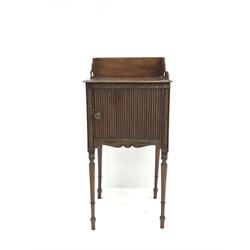 Early 19th century mahogany bedside cabinet, raised shaped back, single cupboard, turned tapering supports 