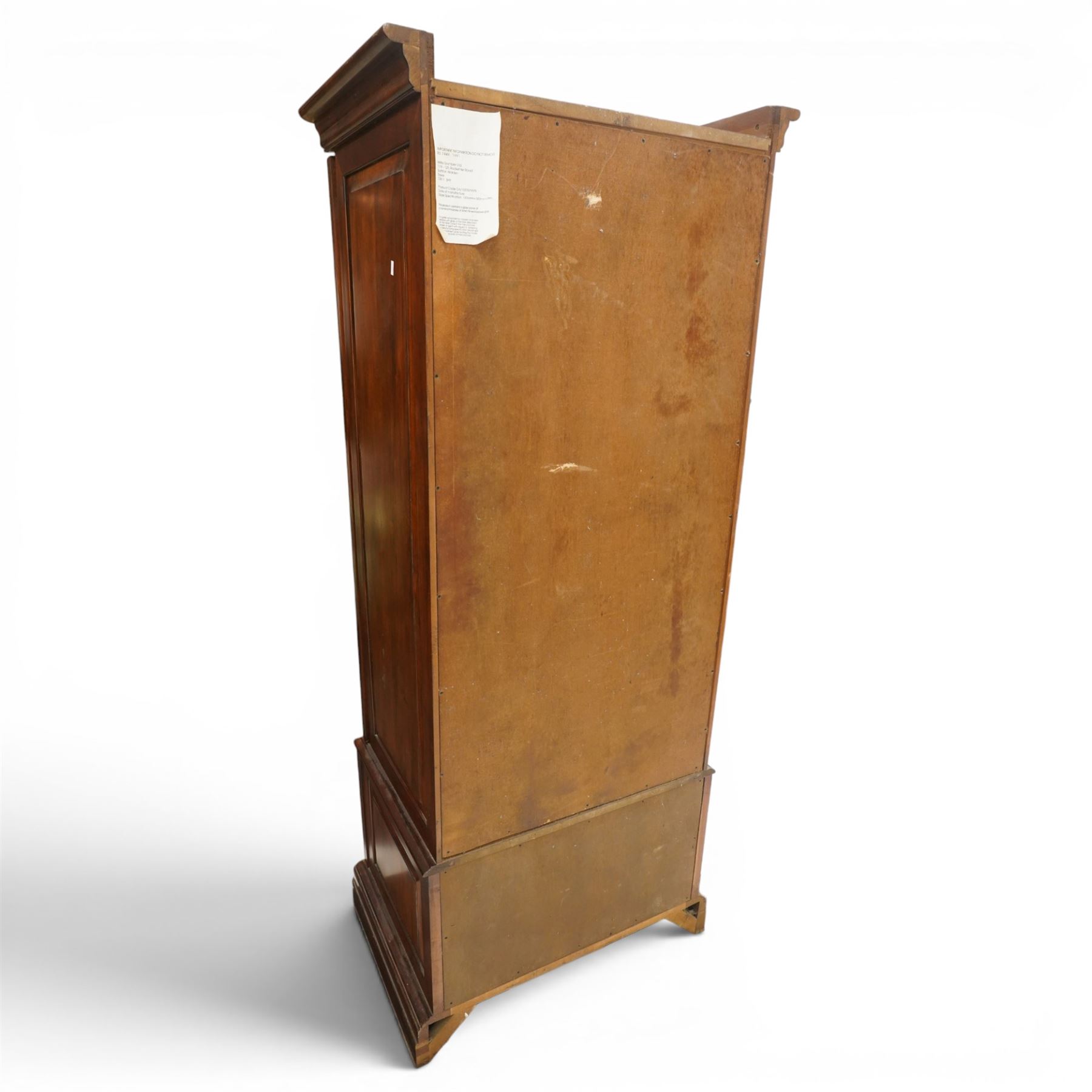 Willis & Gambier - hardwood swing mirrored door cabinet, in a dark cherrywood finish with moulded cornice over mirrored door incorporating adjustable cheval mirror action, enclosing a shelved interior, lower drawer with brass knob handles, panelled sides and stepped plinth base