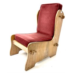 20th century oak chair, upholstered with deep red cushions, stile supports 
