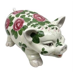 Large ceramic figure of a pig decorated with roses, L45cm